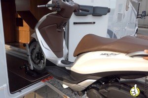 scooter-motor-in-camper-garage-loading track-manual-charging